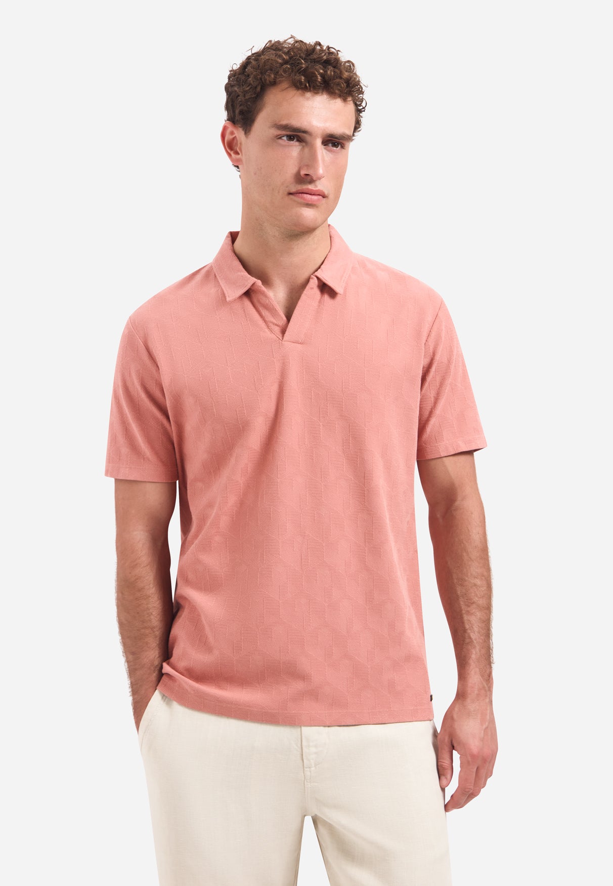 Polohemd mit V-Ausschnitt und kurzen Ärmeln mit Jacquard-Print | Coral